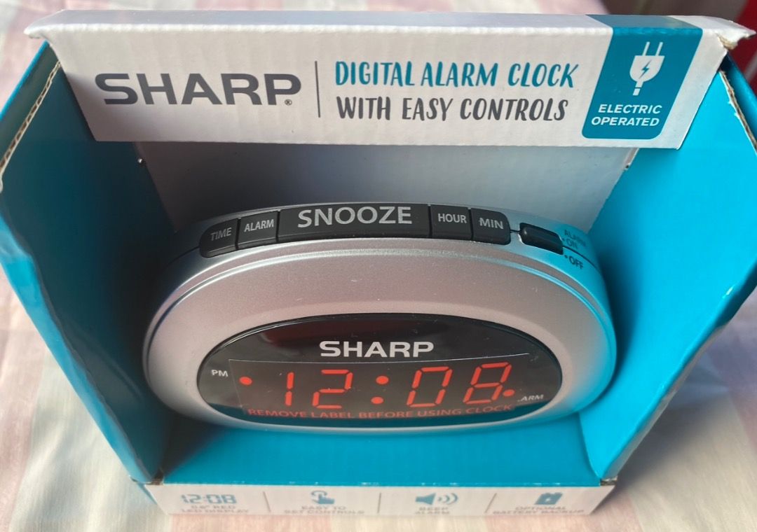 SHARP Digital Alarm Clock (Category: Other Accessories) located in Tiaong. Submitted by bopeep23 (Listing ID 1390399140, Image 2). Description:  Brand New SHARP digital alarm clock with easy controls  Bought at Walmart USA  0.6 inch Red LED display and easy to set controls  with Beep alarm and snooze alarm  Battery backup (used for storing the time and alarm settings if power is interrupted)  Electric operated (110V) USA power  Thanks for 