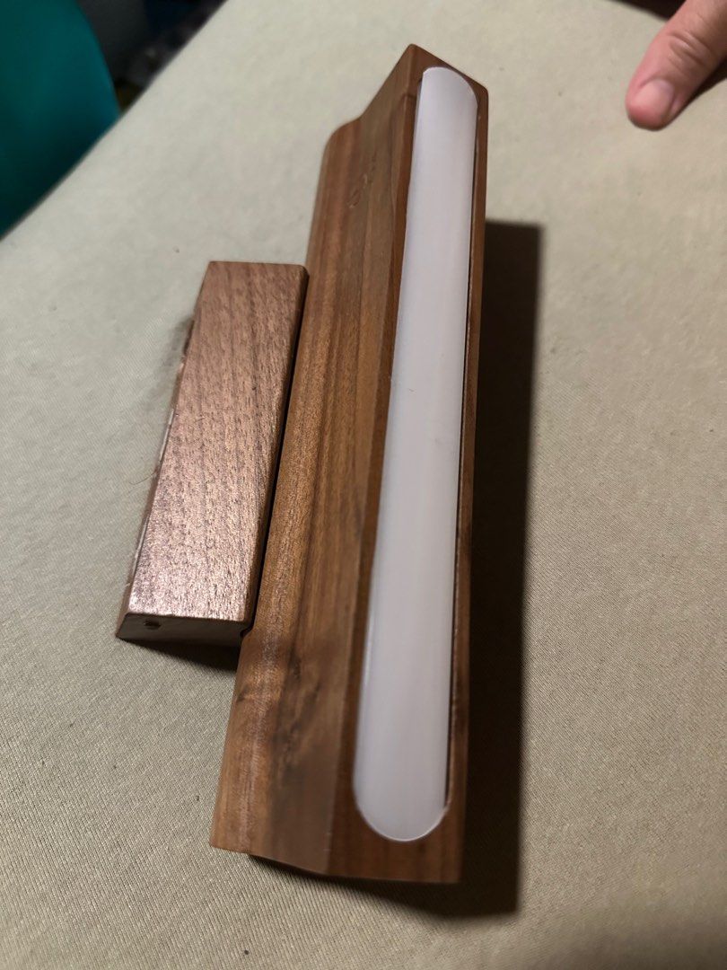 Solid Oak Bedside LED Light (Category: Lighting) located in Singapore. Submitted by salvador_dali (Listing ID 1390378020, Image 2). Description: Classy and warm solid oak wood housing LED light Strong Magnetic wooden mount Adjustable Rechargeable - USB-C Touch / on/off .