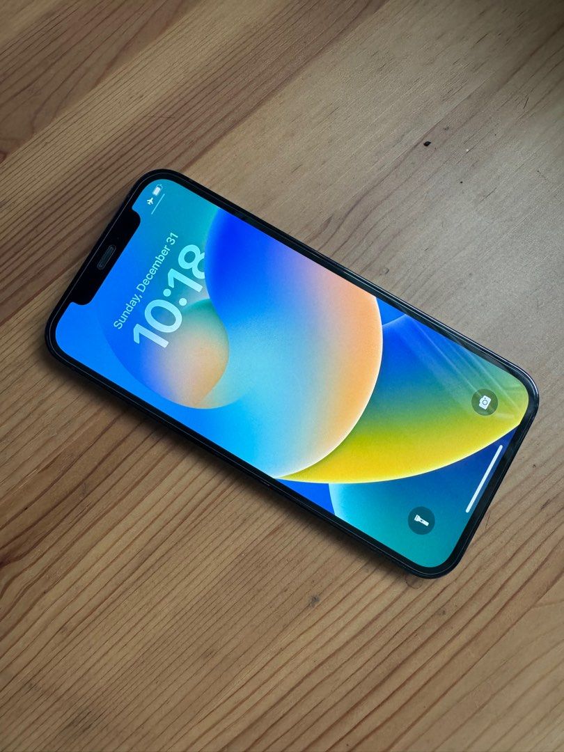 (Category: iPhone 12 Series) located in Singapore. Submitted by hyperunner (Listing ID 1393633342, Image 2). Description: iPhone 12 Pro (Pacific Blue) - No scratches on screen - Clean camera lenses - All buttons fully functional - Comes with original box - battery 98% (changed in apple store) .