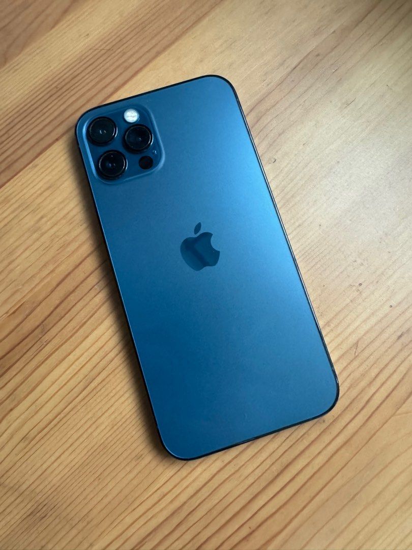 (Category: iPhone 12 Series) located in Singapore. Submitted by hyperunner (Listing ID 1393633342, Image 1). Description: iPhone 12 Pro (Pacific Blue) - No scratches on screen - Clean camera lenses - All buttons fully functional - Comes with original box - battery 98% (changed in apple store) .
