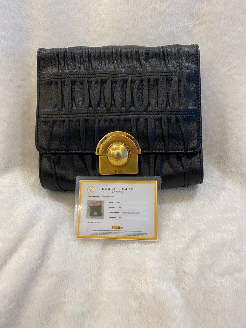 Authentic Vintage Prada Sling Bag (Category: Luxury Bags & Wallets) located in Quezon City. Submitted by ThriftCentralShop (Listing ID 1196429518, Image 1). Description: Purveyor of 100% ALL AUTHENTIC brand new, preloved and limited edition wallet, bags and shoes. 🔵Made in Italy 🔵With Entrupy (Certificate of Authenticity) 🔵With white tag 165 🔵Flaws on the gold hardware as signs of usage 🔵Issue on sling (not included) 🔵No inclusion 🔵 Please