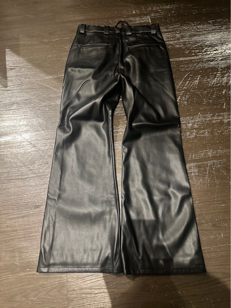 HARE AW23 Flared Leather Trousers (Category: Trousers) located in Taguig. Submitted by sawftscars (Listing ID 1393787200, Image 2). Description: Archival piece from the Japanese Brand Hare Debuted in their A/W season in look 6, with a sleek waxed look, drapes well over any type of shoe. Timeless piece for many aesthetics Bought at 18000 yen, retail (7k~ php) Size small, fits a size 29-31 Waist: 15" (has an inner drawstring) Length: 40" (10" rise)