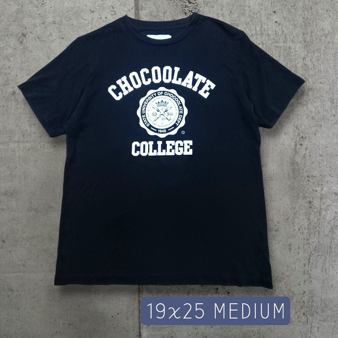 Black Chocolate College T-shirt Medium (Category: Tshirts & Polo Shirts ) located in Quezon City. Submitted by selectorsthrift (Listing ID 1393727893, Image 1). Description: - Brand: Black Chocolate - Style: College T-shirt - Size: Medium - Design: 'CHOCOOLATE COLLEGE' print on front - Neckline: Crew neck - Sleeves: Short sleeves - Measurements: 19x25.