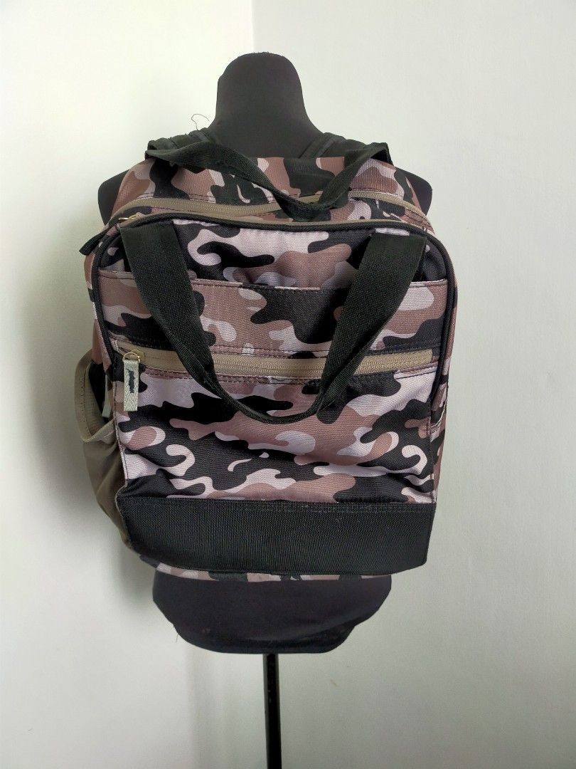 Camouflage backpack bag (Category: Other Babies Going Out Needs) located in Quezon City. Submitted by mcmp1216 (Listing ID 1393639587, Image 1). Description: Best price offered Very roomy and lightweight Clean See photos.