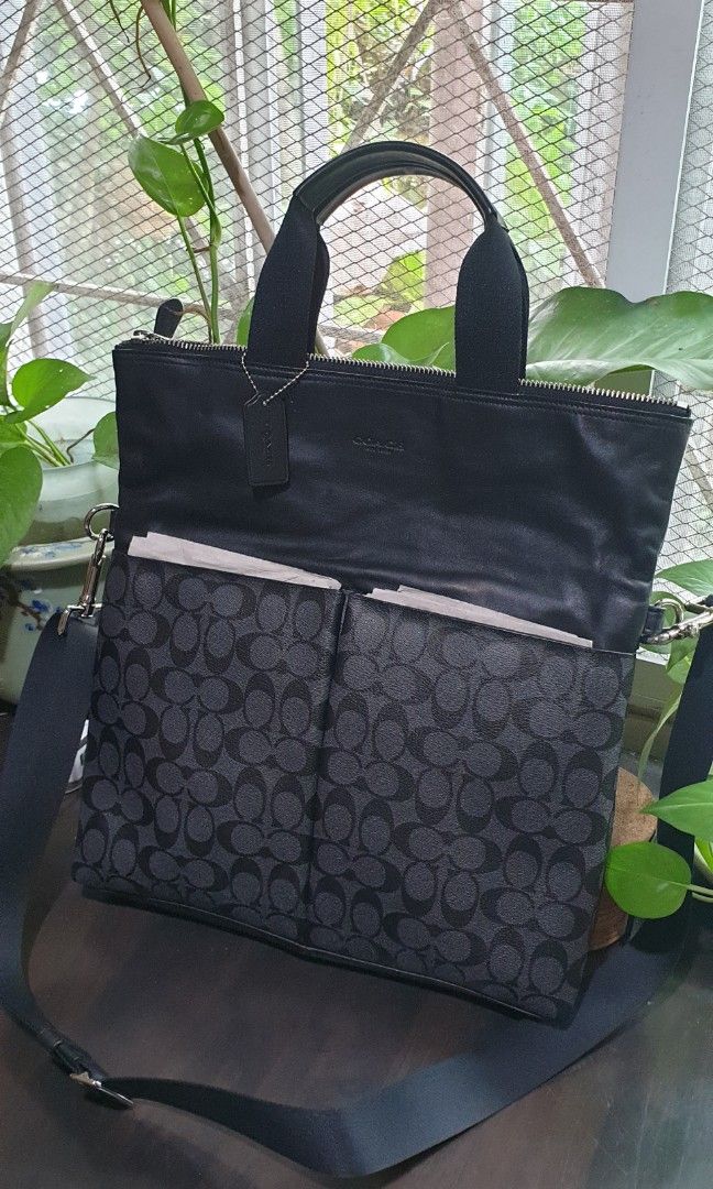 Coach Men's Bag/Body Bag. Large Size (Category: Sling Bags) located in Bacoor. Submitted by jekiaram (Listing ID 1393670246, Image 1). Description: Coach men's bag, can also be worn as body bag. Perfect for office/ school use. Used only twice by my husband . Quite big for him. Bought in Hongkong.