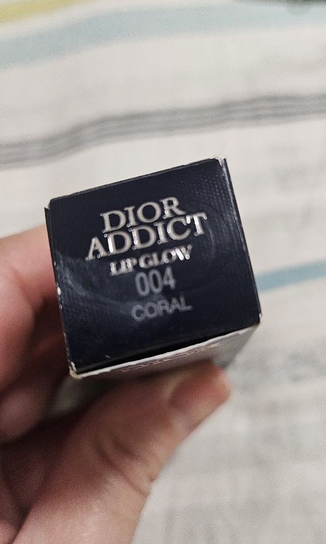 Dior Addict Lip Glow (Category: Makeup) located in Quezon City. Submitted by myprelovedfindsph (Listing ID 1393738917, Image 2). Description: Unused Dior addict lip glow in 004 Coral shade. RFS: wrong shade bought.