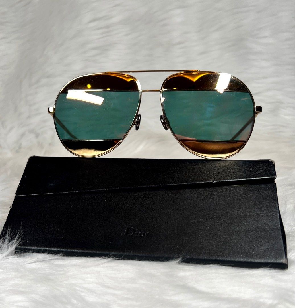 Dior Unisex Split 1 Aviator Sunglasses (Category: Sunglasses & Eyewear) located in Taguig. Submitted by aa_decluttering (Listing ID 1393678172, Image 3). Description: STORE BOUGHT NOT REPLICA! Christian Dior Split 1 Aviator Unisex Sunglasses Frame: Gold Tone Metal Frame with Stylized Aviator Design. Lenses: Pink Rose Gold Mirrored Lenses with Split Effect. Protection: UV400. 100% UVA/UVB protection Inclusion. Box. Care Card .