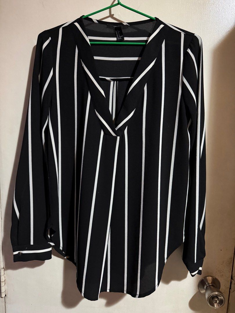 Forever 21 Black & White Striped Polo Top (Category: Longsleeves) located in Marikina City. Submitted by declutteringera (Listing ID 1393753718, Image 1). Description: - size S - fits up to 36" bust since it's loose - in good condition RFS: decluttering.