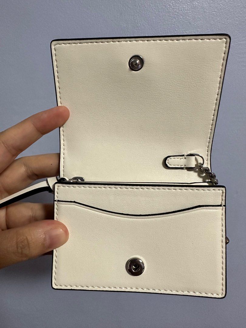 Ganni Card Holder with Flap (Category: Wallets & Card holders) located in Quezon City. Submitted by eimaj08 (Listing ID 1393744782, Image 3). Description: Complete with dust bag.