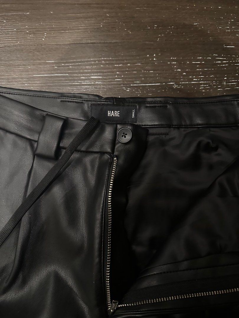HARE AW23 Flared Leather Trousers (Category: Trousers) located in Taguig. Submitted by sawftscars (Listing ID 1393787200, Image 3). Description: Archival piece from the Japanese Brand Hare Debuted in their A/W season in look 6, with a sleek waxed look, drapes well over any type of shoe. Timeless piece for many aesthetics Bought at 18000 yen, retail (7k~ php) Size small, fits a size 29-31 Waist: 15" (has an inner drawstring) Length: 40" (10" rise)