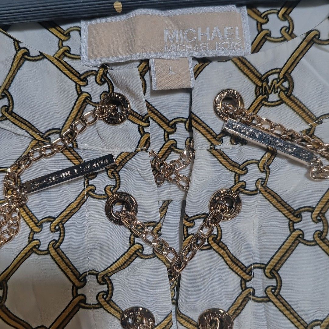 MICHAEL KORS DRESS (Category: Dresses) located in Baguio. Submitted by cc1516 (Listing ID 1393758195, Image 2). Description: MICHAEL KORS DRESS WITH GOLD CHAIN LINK PATTERN WITH LACE UP V NECK.