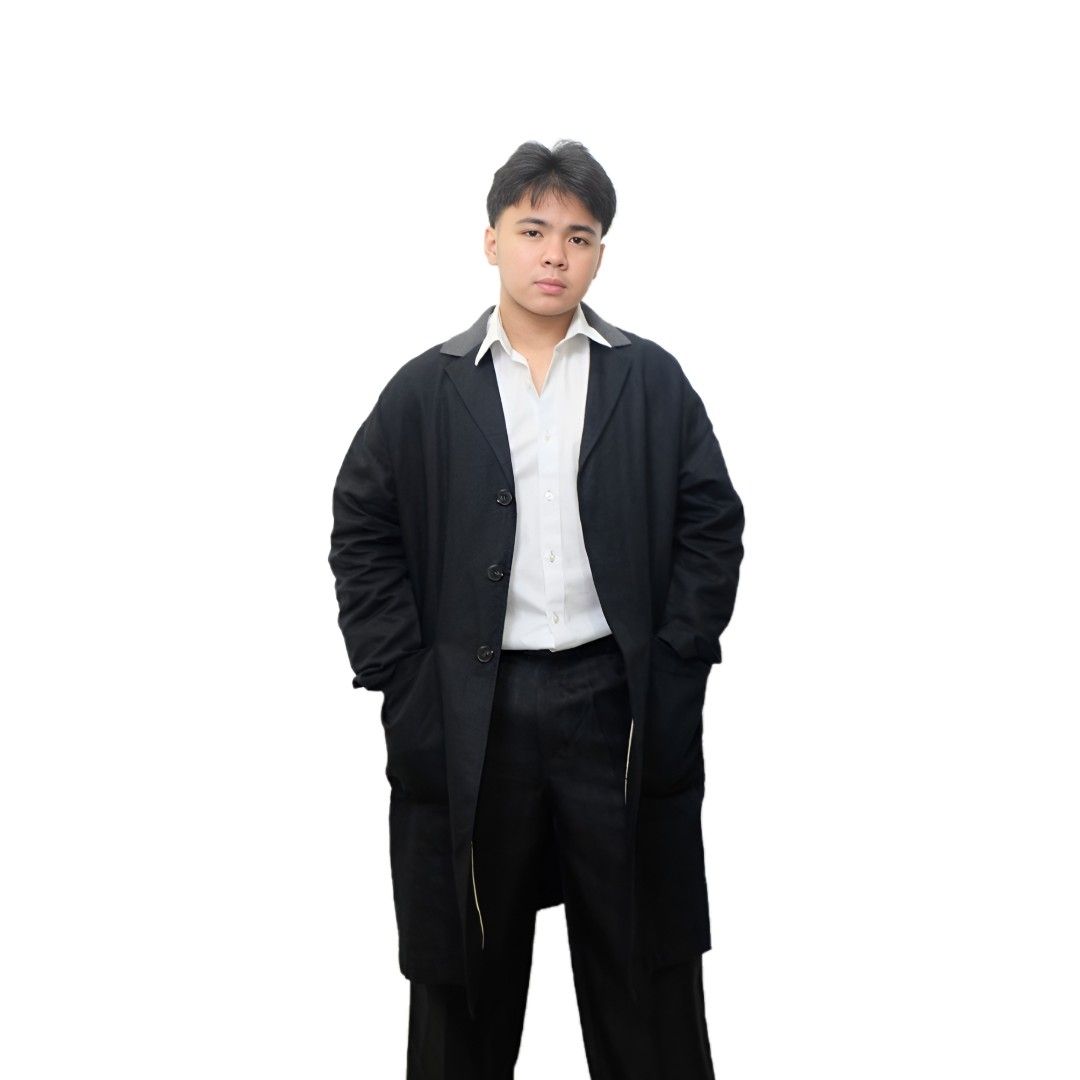 sleek black coat features a long, tailored design crafted from durable fabric. (Category: Coats, Jackets and Outerwear) located in General Trias. Submitted by coatsaleph (Listing ID 1393747802, Image 1). Description: Mine : 350 Size: Large sleek black coat features a long, tailored design crafted from durable fabric. Its relaxed fit, minimalistic lapel collar, and simple button closure offer elegance and comfort, making it perfect for both casual