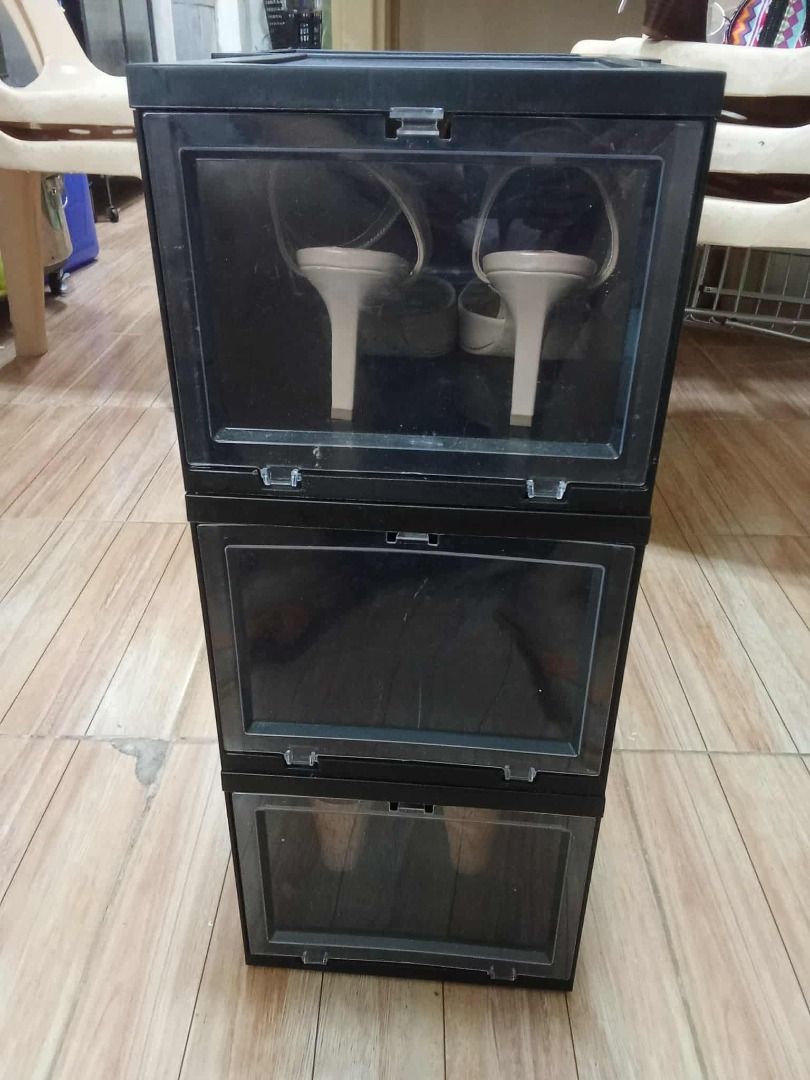 Stackable Shoes Racks/Storage Hard Plastic (6 Pcs) (Category: Shelves, Cabinets & Racks) located in Quezon City. Submitted by ailey888 (Listing ID 1393639415, Image 2). Description: Stackable Shoes Storage Hard Plastic (6 Pcs) Black from The Container Store - Medium Can store Womens shoes sizes 5 -9 Mens size 7- 9 Negotiable to serious buyer. I have A total of 12pcs if you're interested for more .