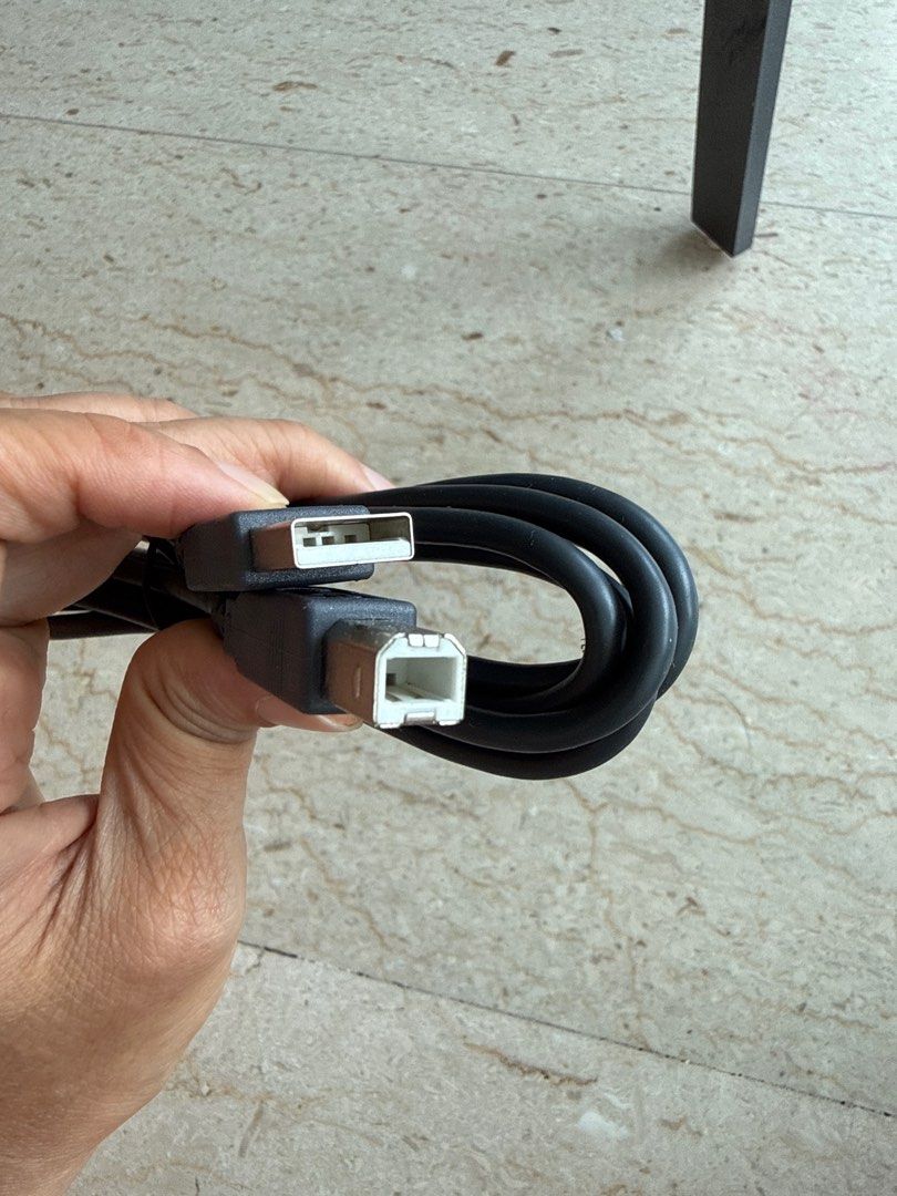USB Printer Cable (Category: Cables & Adaptors) located in Singapore. Submitted by jainmukul (Listing ID 1393643967, Image 1). Description: - USB cable - For printers and devices - USB A to USB B connectors - Black color.