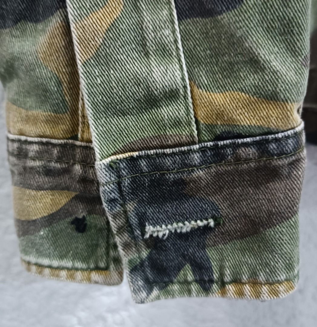 (PRICE DROP) - WTAPS CAMOU DENIM HOODED JACKET (Category: Coats, Jackets and Outerwear) located in Calamba. Submitted by rootsph (Listing ID 1393732012, Image 3). Description: Details: Japanese military inspired brand. Dimes: 21W x 24L Color: Camou Army green Condition: Good, Missing button 2nd from the bottom, missing button on both sleeves, needs wash, complete tags Price: Slightly Negotiable Please manage your expectation, item being sold is p