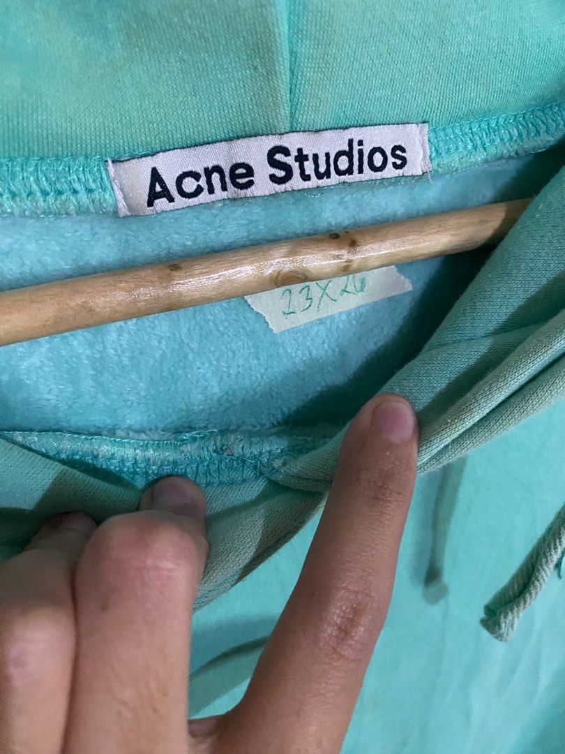 Acne Studios Face Logo Hoodie (Category: Luxury Apparel) located in Guagua. Submitted by branded.thriftssss (Listing ID 1393949725, Image 2). Description: Excellent condition AUTHENTIC No issues Colorate 10/10 Size medium on tag 23 by 26 inches .