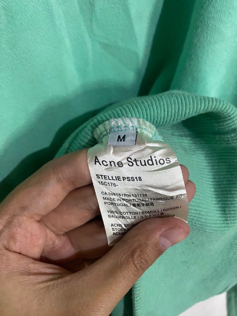 Acne Studios Face Logo Hoodie (Category: Luxury Apparel) located in Guagua. Submitted by branded.thriftssss (Listing ID 1393949725, Image 3). Description: Excellent condition AUTHENTIC No issues Colorate 10/10 Size medium on tag 23 by 26 inches .