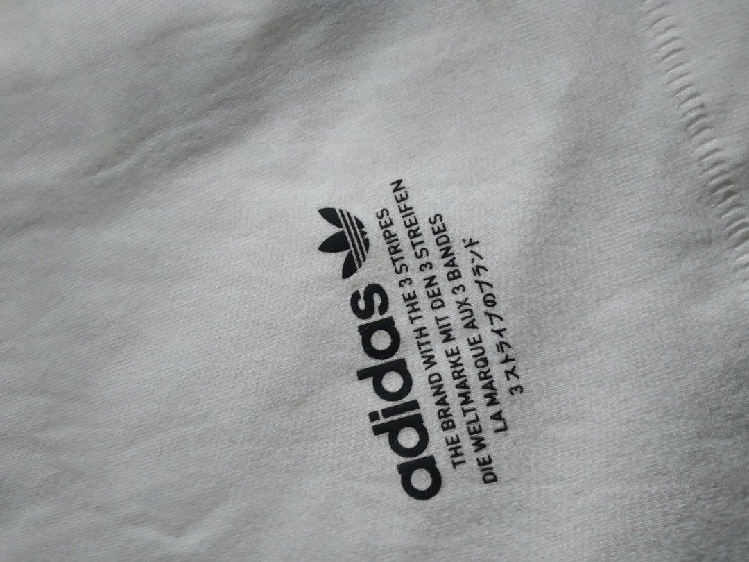 Adidas white shirt (Category: Activewear) located in Makati City. Submitted by closet.declutterph (Listing ID 1393913235, Image 3). Description: 200 each 350 both like new no flaws.