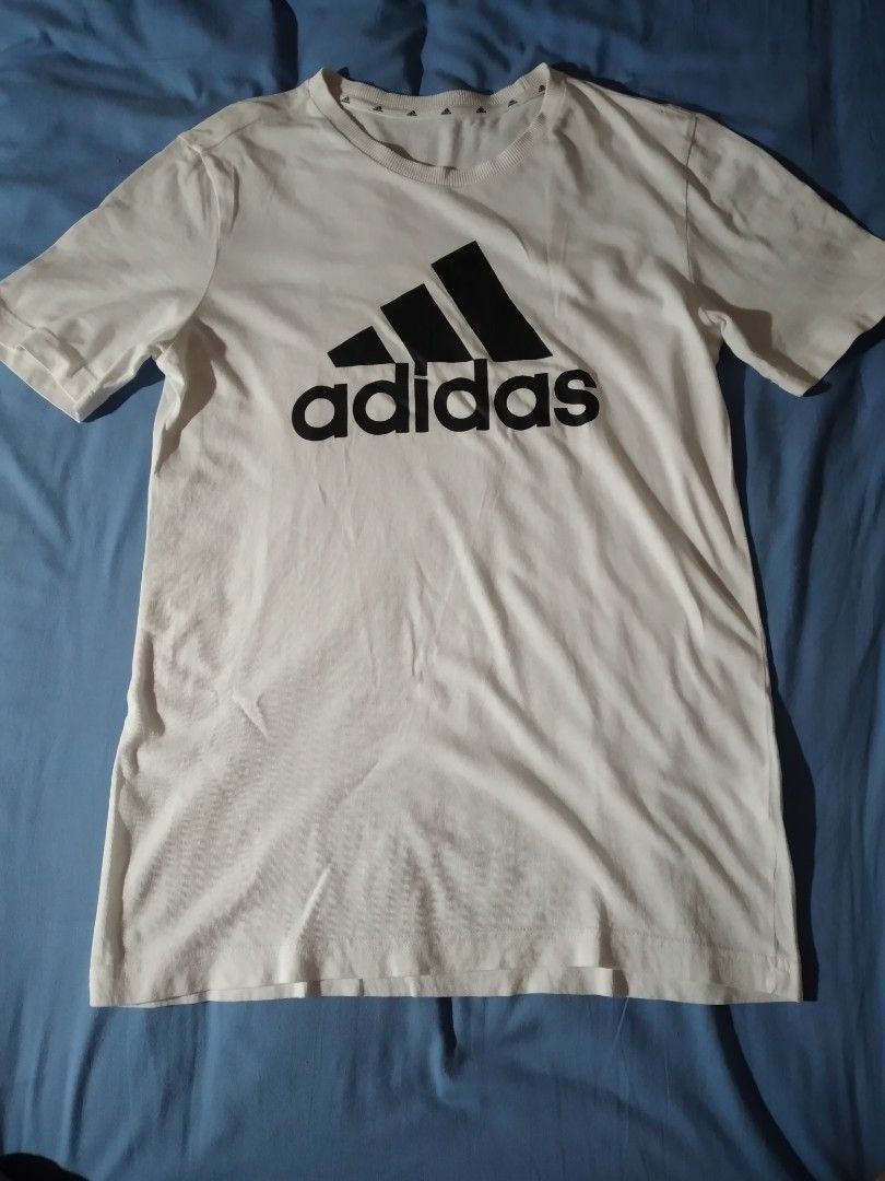 Adidas white shirt (Category: Activewear) located in Makati City. Submitted by closet.declutterph (Listing ID 1393913235, Image 1). Description: 200 each 350 both like new no flaws.