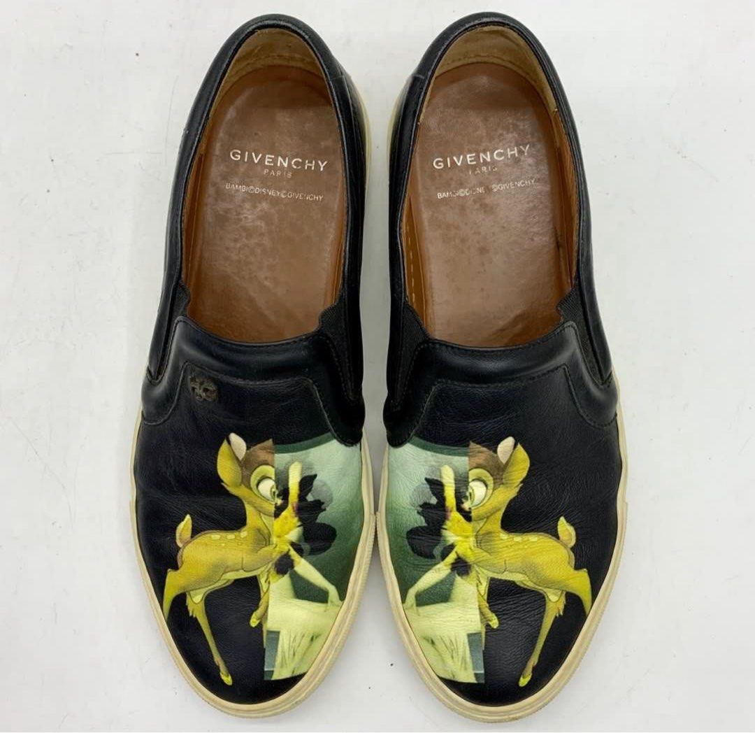 Authentic GIVENCHY Bambi Black Leather Slip On Shoes (Category: Sneakers & Footwear) located in Las Pinas. Submitted by jc_closet (Listing ID 1393937048, Image 2). Description: 💯 Authentic Shoes only. No inclusions. Size : EU 38 (24.5 cm) Flaws : stains, creasing and peeling on exterior. Yellowing on soles. Minor dirts. Overall in a good used condition. Best Buy for Easy Going / Casual OOTD. Shipping c/o Buyer.