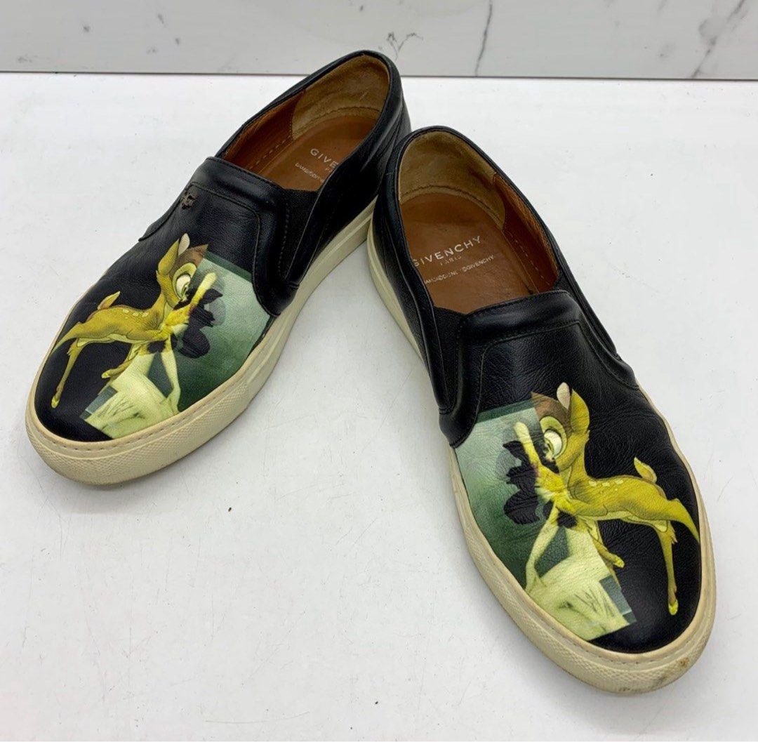 Authentic GIVENCHY Bambi Black Leather Slip On Shoes (Category: Sneakers & Footwear) located in Las Pinas. Submitted by jc_closet (Listing ID 1393937048, Image 1). Description: 💯 Authentic Shoes only. No inclusions. Size : EU 38 (24.5 cm) Flaws : stains, creasing and peeling on exterior. Yellowing on soles. Minor dirts. Overall in a good used condition. Best Buy for Easy Going / Casual OOTD. Shipping c/o Buyer.