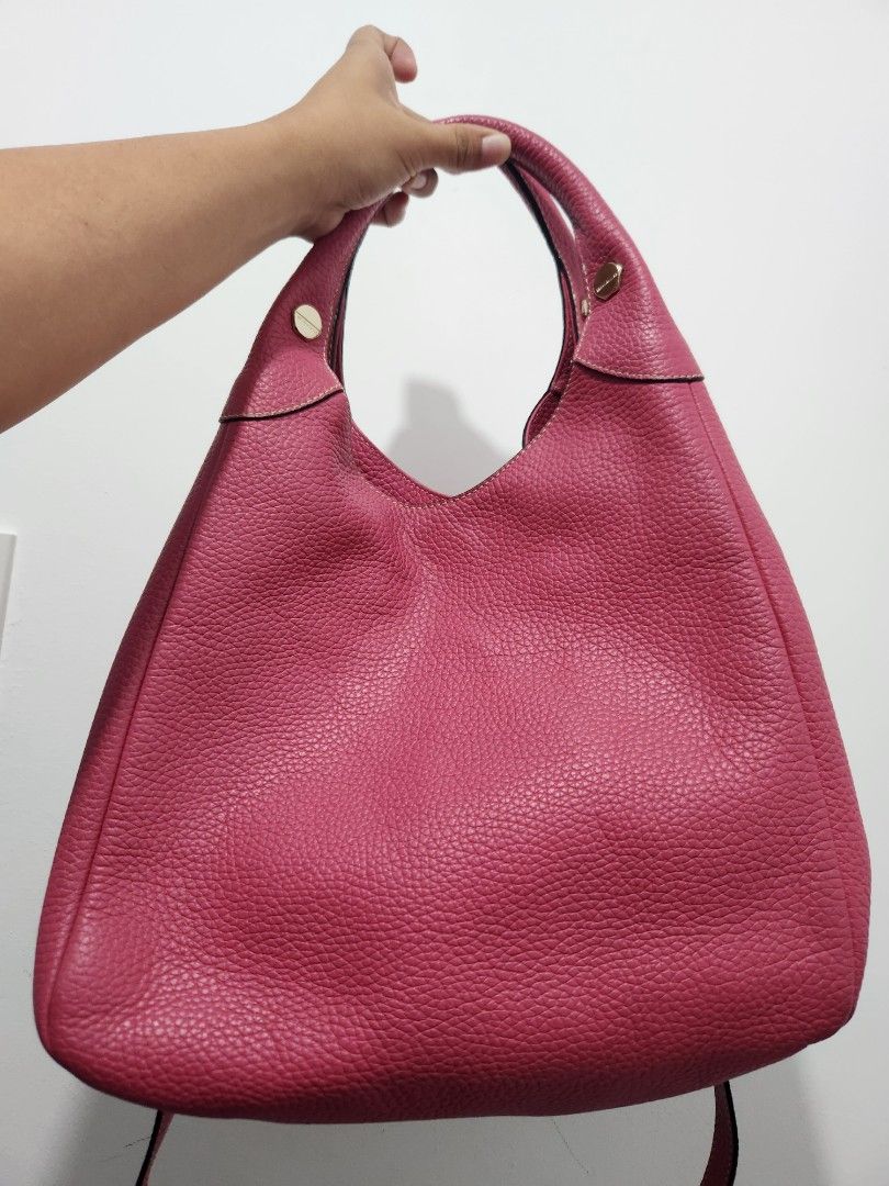 Bruno Magli Soft Genuine Leather (Category: Luxury Bags & Wallets) located in Gapan. Submitted by altheascollection (Listing ID 1393823044, Image 2). Description: Very minimal to not visible slight cracking sa lips Main issue yung sa bottom na discoloration and slight color transfer na di halata..
