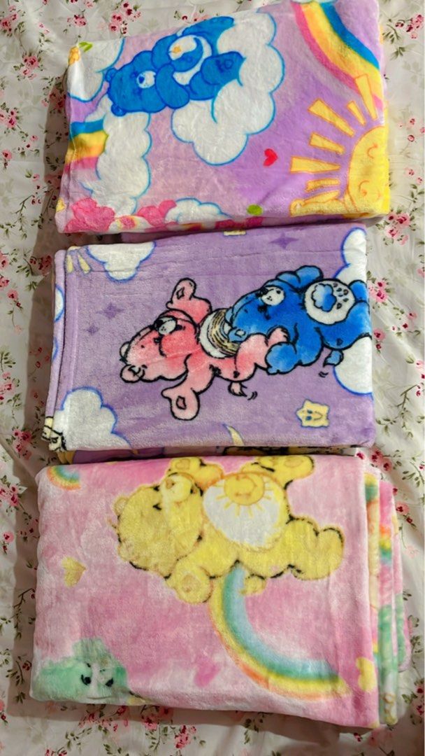 Care bears blanket (Category: Bedding & Towels) located in Caloocan City. Submitted by Gucci00021 (Listing ID 1393874285, Image 1). Description: Care bears blanket fluffy Lavender Violet (SOLD) Pink w tag(SOLD) .