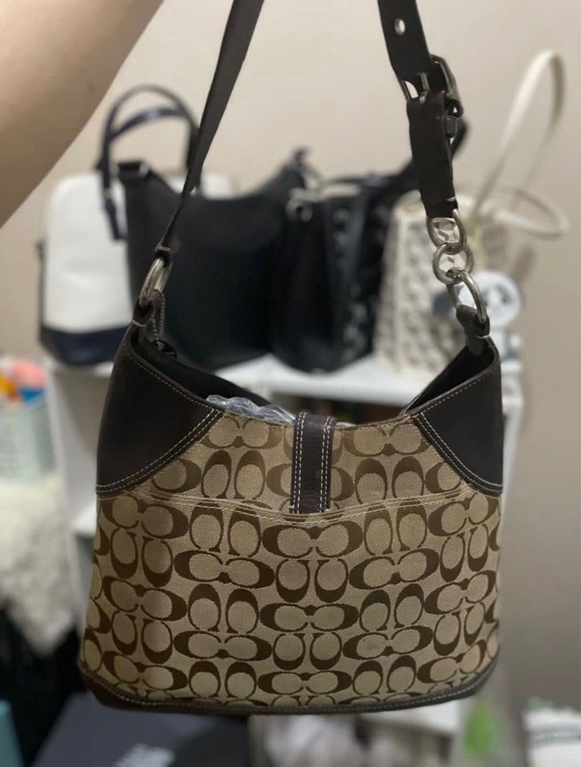Coach Vintage Bag (Category: Luxury Bags & Wallets) located in San Pablo. Submitted by declutterwithmelqc (Listing ID 1393898110, Image 3). Description: ✨Original ✨from japan ✨personal and not from preloved Very minimal lang yung issue kasi napatago yung silver ware nya pwede naman malinis. Other issue need cleaning lang talaga. Pasalubong to sakin from japan wayback 2010.