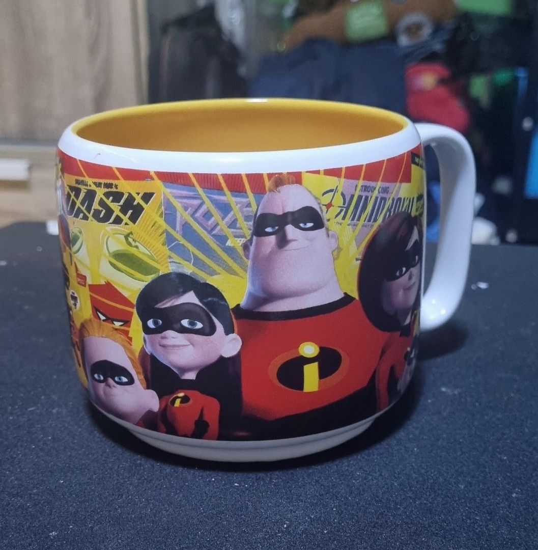 Disney Pixar The Incredibles Mug (Category: Coffee & Tea Tableware) located in Manila. Submitted by ags028705 (Listing ID 1393828663, Image 1). Description: - Disney's The Incredibles mug - Features characters and logo - Authentic Disney Store product - Made in Thailand - Dishwasher safe - Microwave safe - Yellow interior - COD.