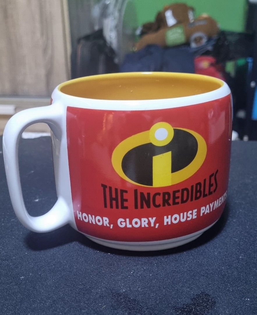 Disney Pixar The Incredibles Mug (Category: Coffee & Tea Tableware) located in Manila. Submitted by ags028705 (Listing ID 1393828663, Image 2). Description: - Disney's The Incredibles mug - Features characters and logo - Authentic Disney Store product - Made in Thailand - Dishwasher safe - Microwave safe - Yellow interior - COD.