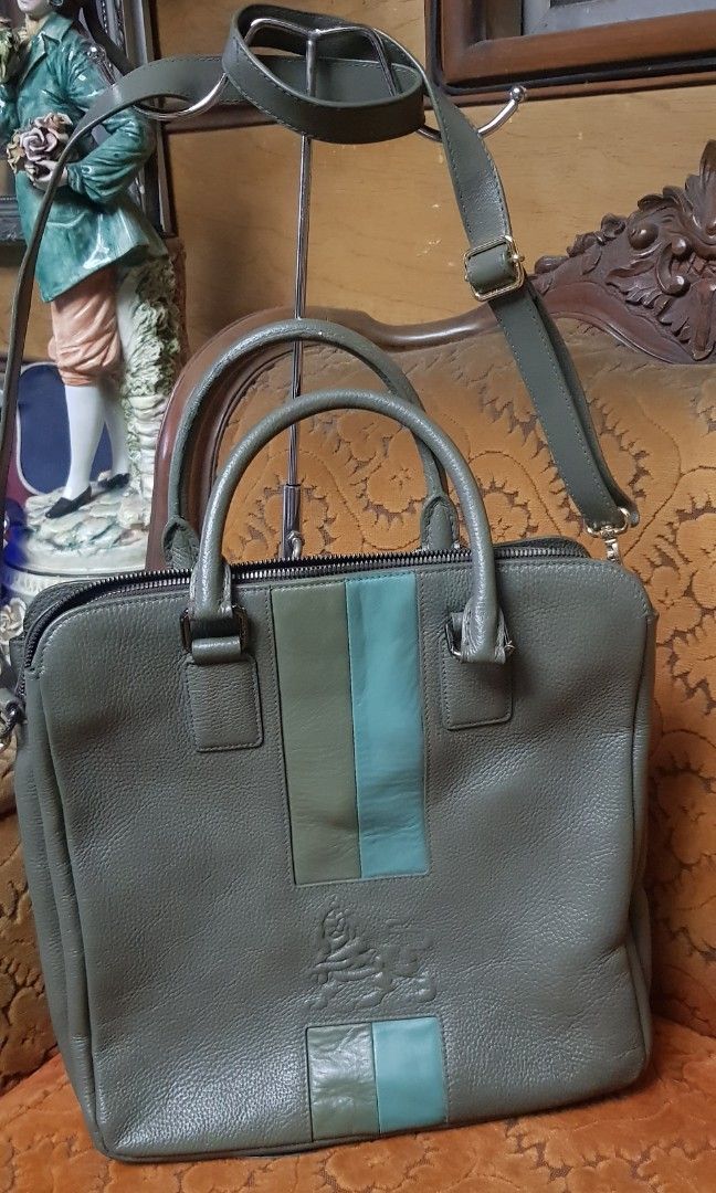 Grayish-green MCM leather 2-way bag (Category: Cross-body Bags) located in Quezon City. Submitted by practibagsplusmnl (Listing ID 1393877943, Image 1). Description: Grayish-green MCM leather 2-way bag; original sling vertical, box-type. Thick, heavy, but soft leather..