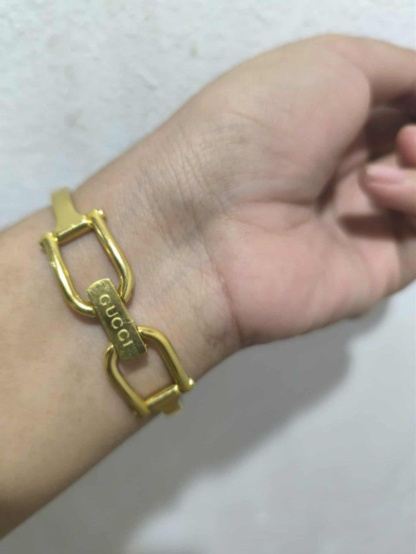 Gucci bangle 1500L gold watch (Category: Luxury Watches) located in Quezon City. Submitted by maeclosetph (Listing ID 1393839403, Image 3). Description: .
