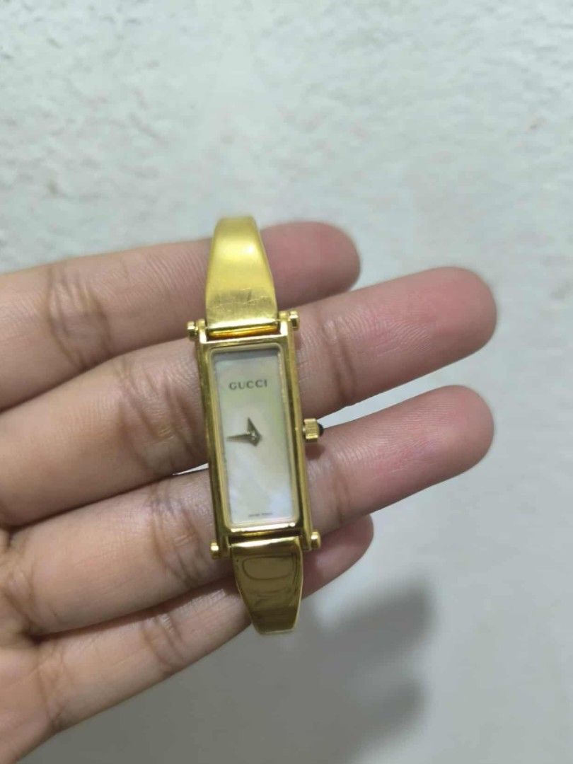 Gucci bangle 1500L gold watch (Category: Luxury Watches) located in Quezon City. Submitted by maeclosetph (Listing ID 1393839403, Image 2). Description: .