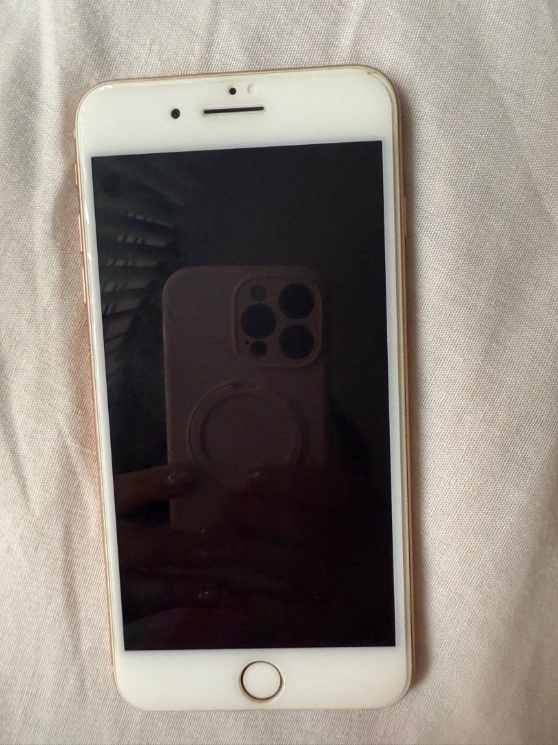 IPHONE 8 PLUS 64GB (Category: iPhone 8 Series) located in Manila. Submitted by artyreal (Listing ID 1393824573, Image 2). Description: As is where is 73% Battery Health With slightly visible cracks & marks on the upper right of the screen.