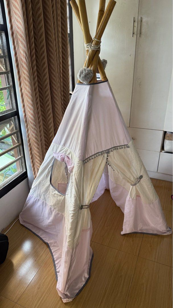 pottlyntubby teepee tent (Category: Infant Playtime) located in Las Pinas. Submitted by sunnysellsph (Listing ID 1393820089, Image 2). Description: for sale / selling / wts lfb pottlyntubby teepee tent used but in good condition color: pink and white material: cotton mop: gcash / seabank / bank transfer mod: lalamove / flash express / meet up at sm southmall .