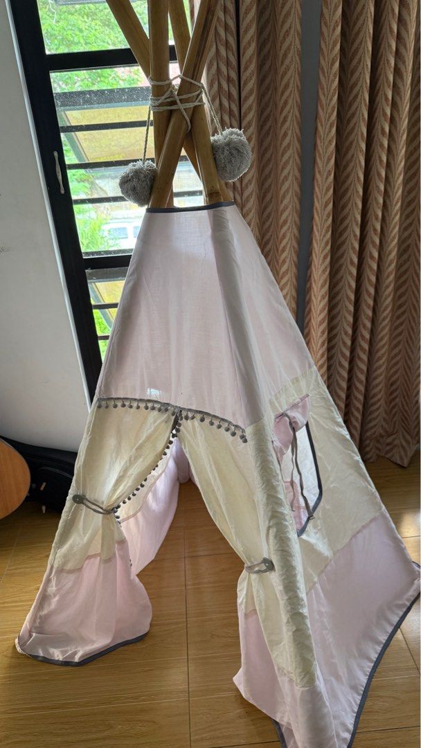 pottlyntubby teepee tent (Category: Infant Playtime) located in Las Pinas. Submitted by sunnysellsph (Listing ID 1393820089, Image 3). Description: for sale / selling / wts lfb pottlyntubby teepee tent used but in good condition color: pink and white material: cotton mop: gcash / seabank / bank transfer mod: lalamove / flash express / meet up at sm southmall .