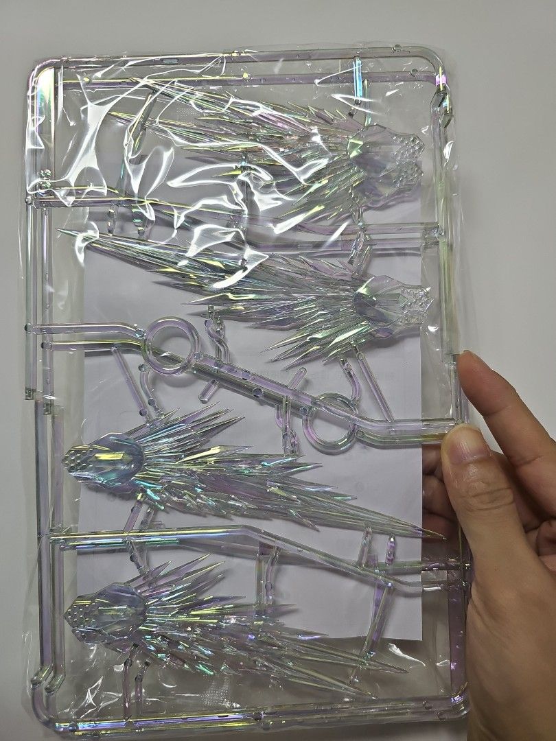 Special Effect Parts for Cal-Re.A gundam (Category: Gundam Model Kits) located in Singapore. Submitted by jgmt.fr (Listing ID 1393972236, Image 1). Description: - Unused effect parts for model kits - Iridescent finish - Still on the sprue - Original packaging included - Adds visual flair to your model.