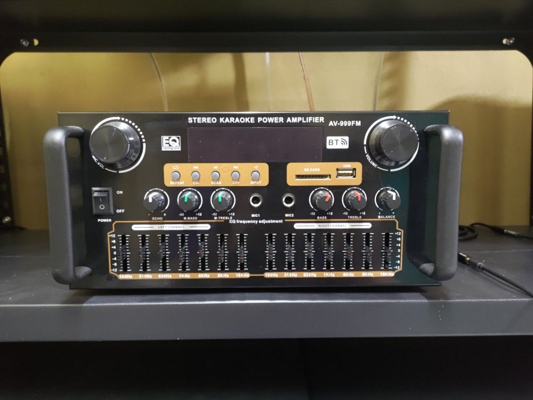 Stereo Karaoke Power Amplifier AV-999FM (Category: Soundbars, Speakers & Amplifiers) located in Quezon City. Submitted by trick1892 (Listing ID 1393969161, Image 2). Description: -- Home Theater Amplifiers -- Car Audio Amplifier -- Hifi Stereo Digital Audio -- Subwoofer Amplifier -- Amplifier Audio -- No Box -- No Issue Specification: 1.Rated voltage: AC220V/DC12V 2.Rated power: 60W*4 3.Peak power: 1300W 4.Standard impedance: 4 to 16 ohm Feature: