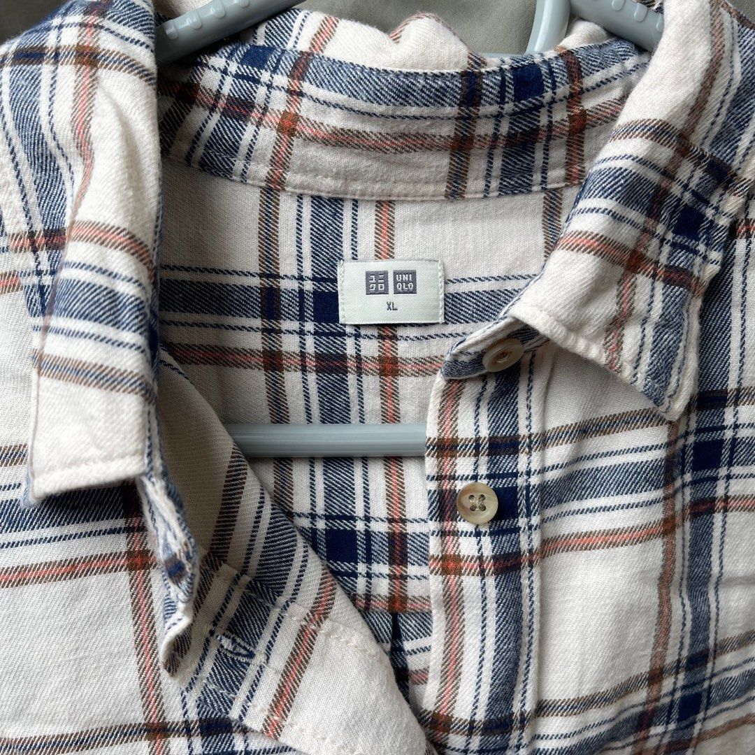 Uniqlo Long sleeve Polo (Category: Tshirts & Polo Shirts ) located in Quezon City. Submitted by pepsidom (Listing ID 1393841470, Image 3). Description: Uniqlo Long sleeve polo Plaid design Cream base with blue/orange Size xl used twice only length 26 inches top to bottom width 22 inches across.