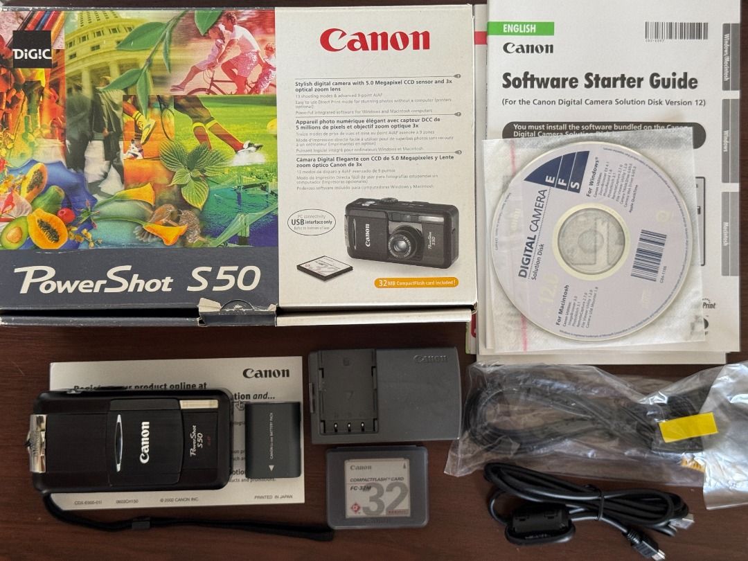 Vintage Canon PowerShot S50 (Category: Cameras) located in Quezon City. Submitted by niwdr0 (Listing ID 1393838206, Image 1). Description: Selling my personal camera Early 2000's Canon PowerShot S50 for Php. 5,700 **GDrive link for samples: https://drive.google.com/drive/folders/1tT_F88xNgd6Z7lW3rGB5-0fZZwu4L7l8?usp=sharing Condition: 9.5/10 almost mint condition. Minor scratches on the frame (see pictures) Issues: None Inclusions: • Unit • 2x Ca