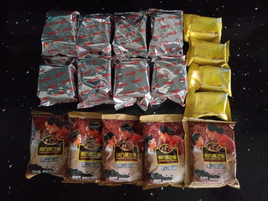 Assorted Snacks Bundle (Category: Packaged & Instant Food) located in Singapore. Submitted by soaplantea (Listing ID 1394159628, Image 1). Description: Mix bag of Meiji Plain Crackers, Pineapple Shortcakes and Black Sesame Powder Pls collect by end September.