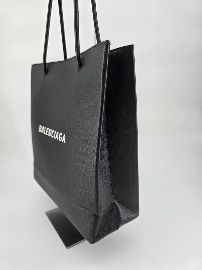 AUTHENTIC Balenciaga Leather Shopping Tote (Category: Luxury Bags & Wallets) located in Caloocan City. Submitted by vinnnccc (Listing ID 1394113029, Image 3). Description: With long strap.