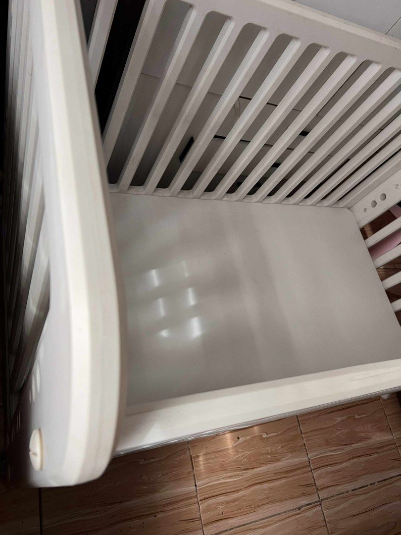 BONJOUR BABY MULTIPURPOSE CONVERTIBLE CRIB (Category: Cots & Cribs) located in Bulacan. Submitted by manilamanilamanila (Listing ID 1394119170, Image 2). Description: BONJOUR BABY MULTIPURPOSE CONVERTIBLE CRIB PRELOVED (Can be turned to crib, bed, table) Used for few months only One screw missing but does not affect the crib Needs to glue one pressed part Needs thorough cleaning Orig price 11k Selling for 8k only negotiable for sure buyers Pick u