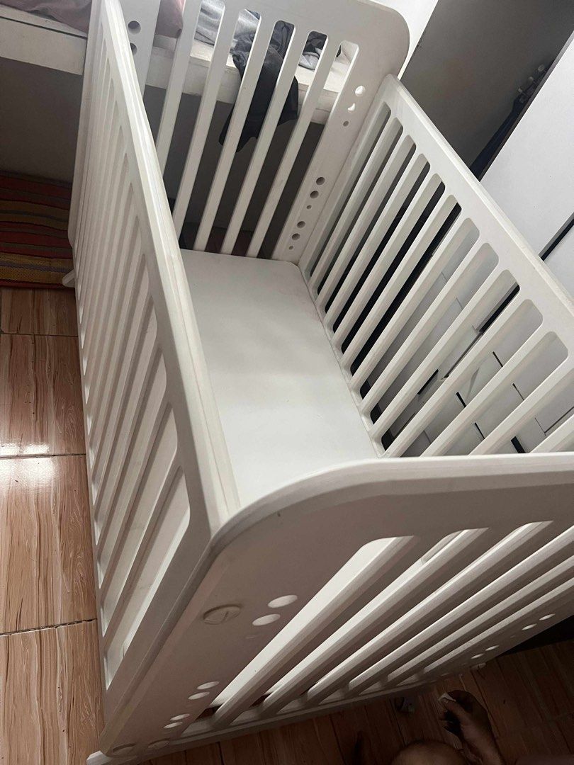 BONJOUR BABY MULTIPURPOSE CONVERTIBLE CRIB (Category: Cots & Cribs) located in Bulacan. Submitted by manilamanilamanila (Listing ID 1394119170, Image 1). Description: BONJOUR BABY MULTIPURPOSE CONVERTIBLE CRIB PRELOVED (Can be turned to crib, bed, table) Used for few months only One screw missing but does not affect the crib Needs to glue one pressed part Needs thorough cleaning Orig price 11k Selling for 8k only negotiable for sure buyers Pick u