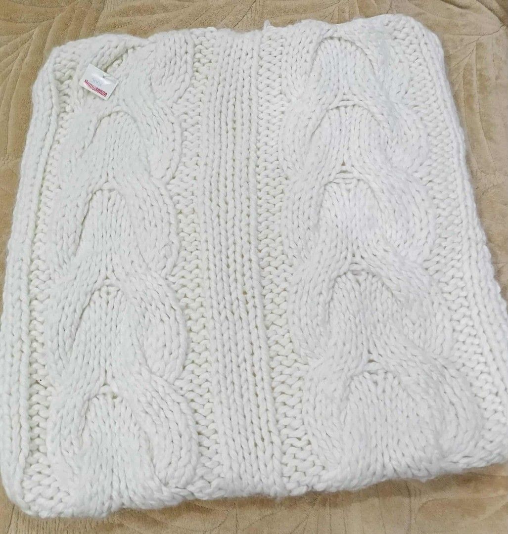 Cable Knit Throw pillow case (Category: Bedding & Towels) located in Baguio. Submitted by gabierfinds (Listing ID 1394042407, Image 1). Description: - Off-white cable knit - Classic cable knit design - Adds warmth and texture - Soft and cozy material - Ideal for couch or bed 50 cms x 50cms.