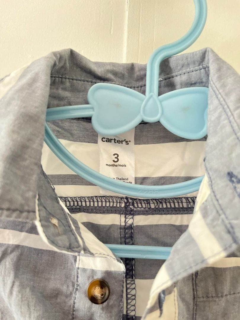 Carter's Striped Romper 3 Months (Category: Babies & Kids Fashion) located in Quezon City. Submitted by gianna30 (Listing ID 1394064363, Image 2). Description: - Carter's baby romper - Size: 3 months - Color: Blue and white stripes - Design: Short sleeves, collared neckline - Closure: Button-down front and snaps at the bottom - Features: Chest pocket ❇️Preloved po ito. Manage your expectations. ❇️Last Price Posted. ❌ No meet up ❌ No to bogus buye