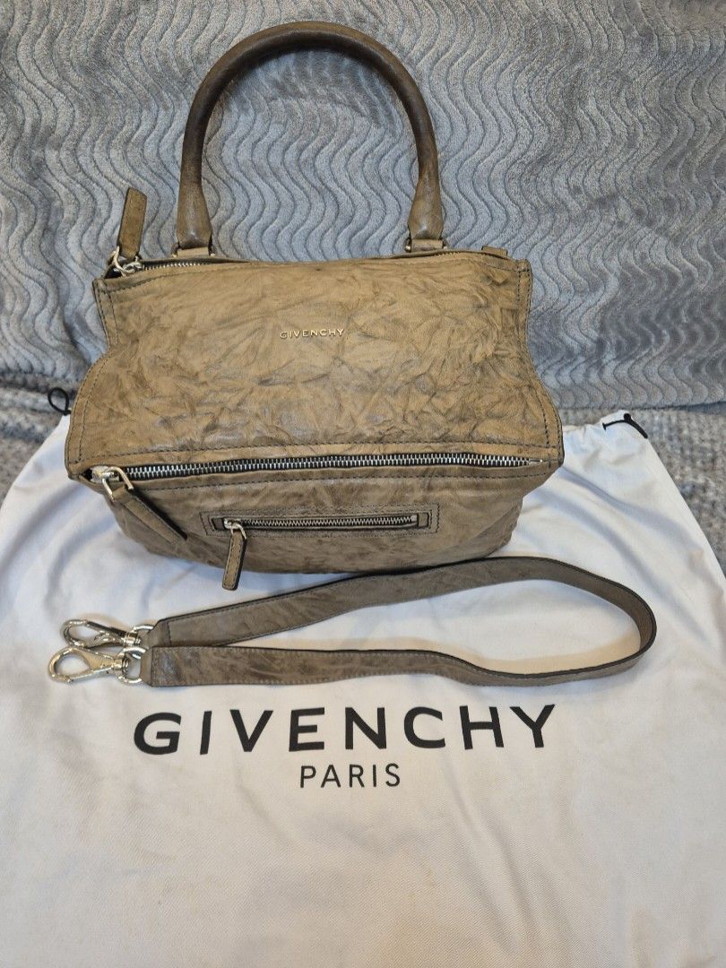 Givenchy pandora medium brown with certificate (Category: Luxury Bags & Wallets) located in Manila. Submitted by gcuraming (Listing ID 1390966721, Image 1). Description: lightly used minor signs of usage only, no tarnishing, no scuffs, no smell with original dustbag & certificate of authenticity from legitrails measurements (medium size): Length 13in Height 7 in Width 6 in sf c/o buyer from sampaloc manila or makati (grab/lalamove) available for 