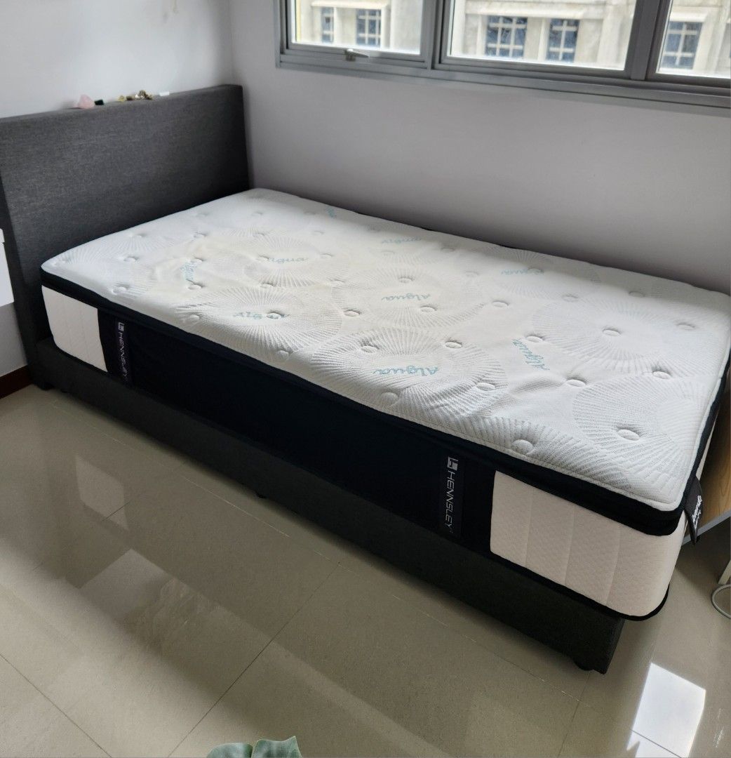 Hennsley Alqua Mattress (With Divan, 1 Set of Tencel Bedsheet) (Category: Bed Frames & Mattresses) located in Singapore. Submitted by yin0_0 (Listing ID 1393883397, Image 1). Description: - Hennsley Alqua mattress - Quilted white top with unique pattern, excellent support - Black sides with side handles - Grey Divan - 1 set of lightly used Tencel bedsheet (Hooga) - 1 set of lightly used mattress protector - Please view photos for details - Self-c