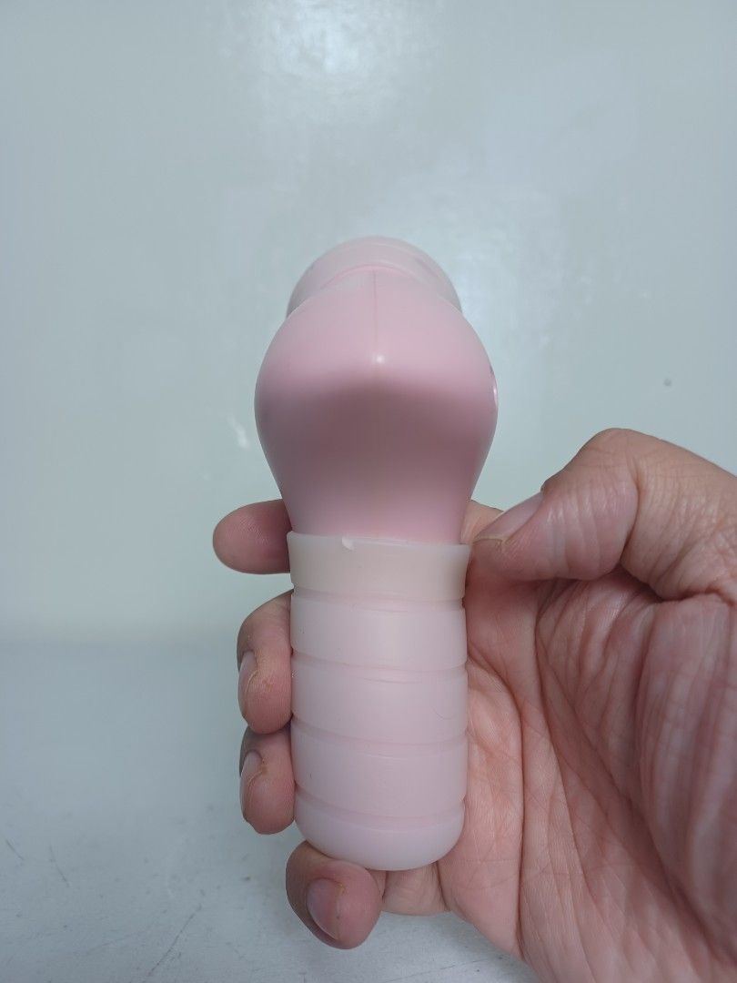 Mini Massager (Category: Massage Devices) located in Baguio. Submitted by restyrille77846 (Listing ID 1394081033, Image 1). Description: - Pink mini massager - USB charging port - Rounded head for targeted massage - Compact and portable design - Simple power button operation.