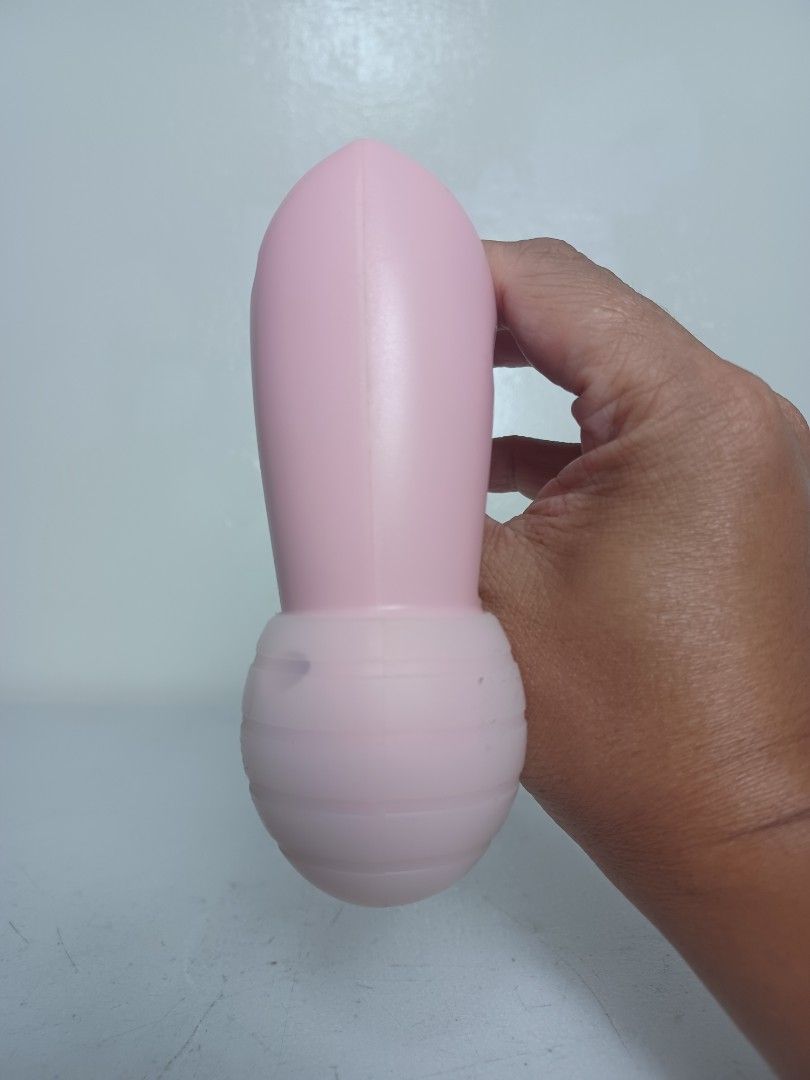 Mini Massager (Category: Massage Devices) located in Baguio. Submitted by restyrille77846 (Listing ID 1394081033, Image 2). Description: - Pink mini massager - USB charging port - Rounded head for targeted massage - Compact and portable design - Simple power button operation.